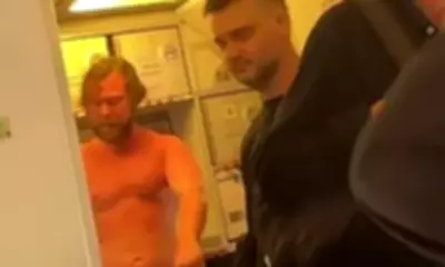 Air Asia Flight Forced into Emergency Landing by Unruly Passenger