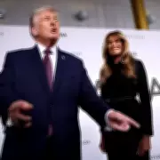 Awkward Red Carpet Moment as Donald Trump Resists Solo Spotlight for Melania