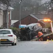Bolton crash: Four dead as community demands action on 'dangerous' Wigan Road