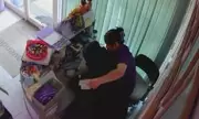 CCTV shows London massage parlour worker shoved during £250 till snatch