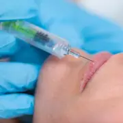 Influencer's Allergic Reaction to Lip Filler Dissolving Goes Viral