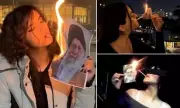 Iranian Women Defy Regime by Lighting Cigarettes with Burning Images of Khamenei