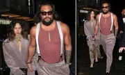 Jason Momoa's Gentlemanly Gesture: Actor Shields Girlfriend Adria Arjona from London Chill
