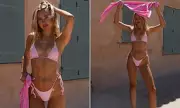 Kimberly Garner Unveils Sunday Swimwear Rebrand in Pink Bikini Display