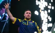 Littler and Anderson Triumph in Thrilling World Darts Championship Semi-Final Clashes