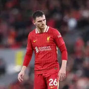 Liverpool's Left-Back Dilemma: Robertson Exit Could Prompt Tsimikas Recall