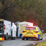 Man, 40, charged with murder after human remains found in Somerset village