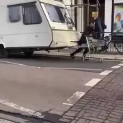 Man's Heartbreaking Reason for Pulling Caravan Through Streets with Shopping Trolley