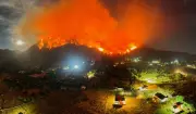 Patagonia Wildfires: Over 18,000 Hectares Ravaged Amid Funding Cuts and Conspiracy Theories