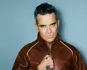 Robbie Williams' 'Britpop' Album: A Nostalgic Yet Unpredictable 90s Trip