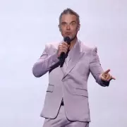 Robbie Williams Drops BRITPOP Album 3 Weeks Early in Surprise Release