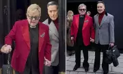Sir Elton John Attends Paris Fashion Show with Husband Amid Ongoing Vision Battle