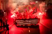 Swiss Protesters Burn US Flags as Trump Faces European Backlash Over Greenland Ambitions