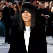 Traitors fans stunned as Claudia Winkleman's fringe-free 1996 look emerges
