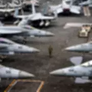 Trump's 'Massive Armada' Expands as USS Delbert D Black Joins Middle East Fleet