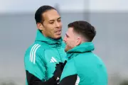 Van Dijk Urges Liverpool to Keep Robertson as Tottenham Circle for Defender