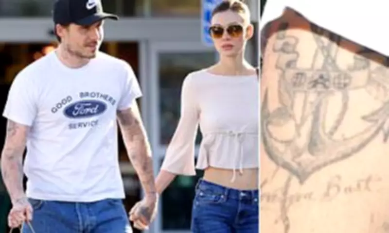 Brooklyn Beckham Covers Up Father David's Tattoo Amid Family Feud
