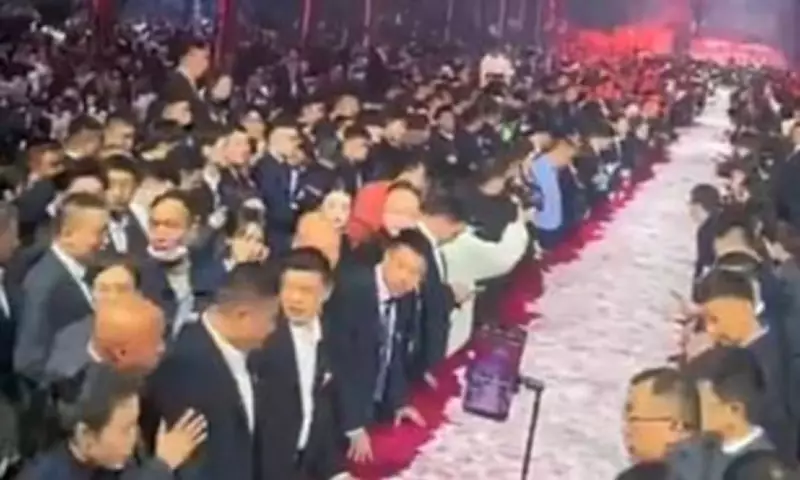 Chinese Crane Firm's $26 Million Cash Party: Employees Grab Bonuses by Hand