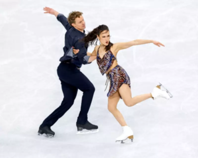 Chock and Bates Set World Record as Olympic Figure Skating Competition Begins