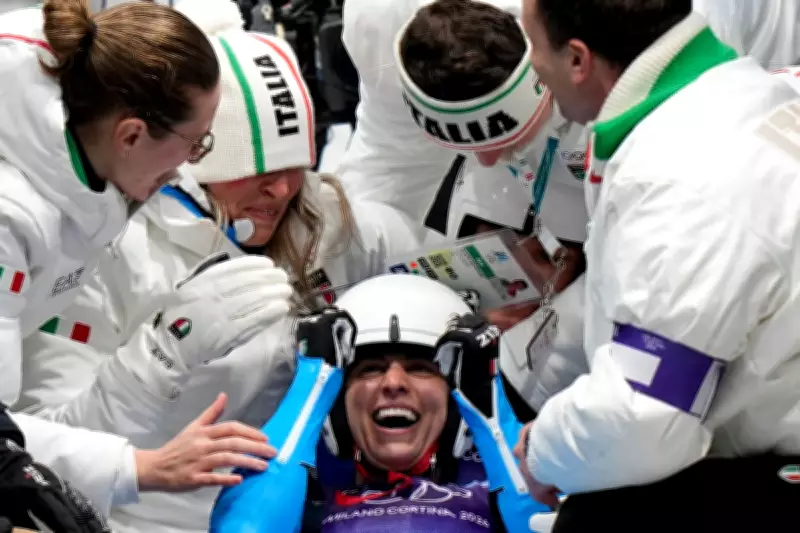Golden Luge Victory: Italy's Emotional Olympic Triumph Captured in Photo