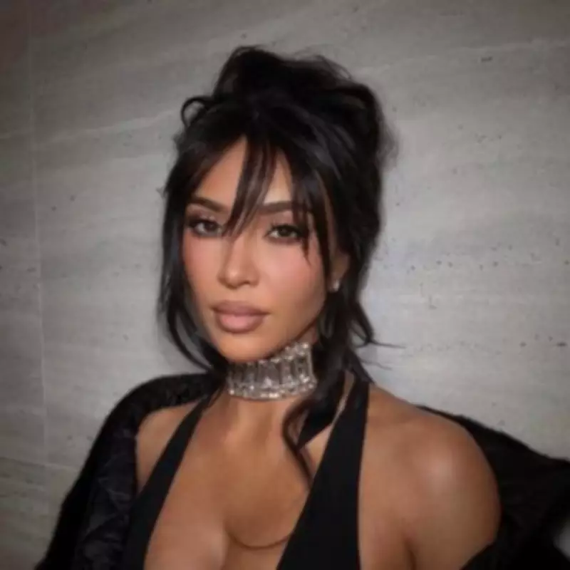 Kim Kardashian's Pamela Anderson-Inspired Look for Super Bowl Date with Lewis Hamilton