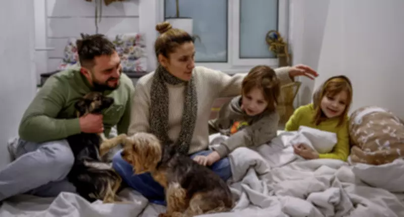 Kyiv Family's Struggle: Enduring Russia's Energy Siege Amid War