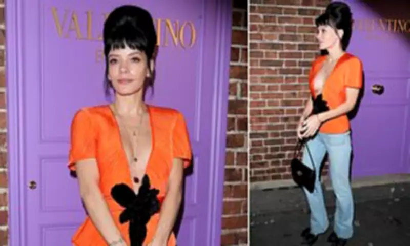 Lily Allen Stuns in Orange Plunge Blouse at Valentino Beauty Bash in London
