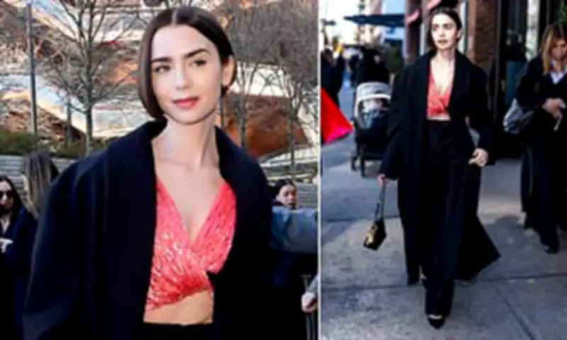Lily Collins Stuns at Calvin Klein Show in Coral Crop Top and Black Trench