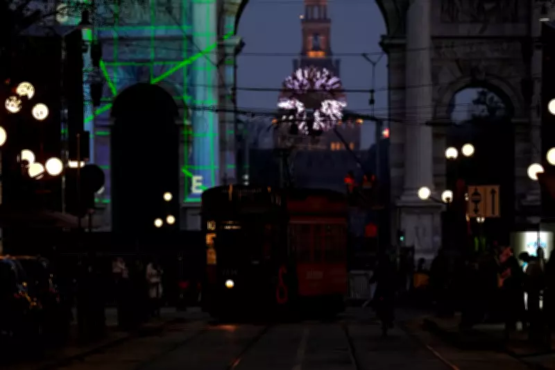 Milan's Historic Trams Illuminate Night as Winter Olympics Preparations Intensify