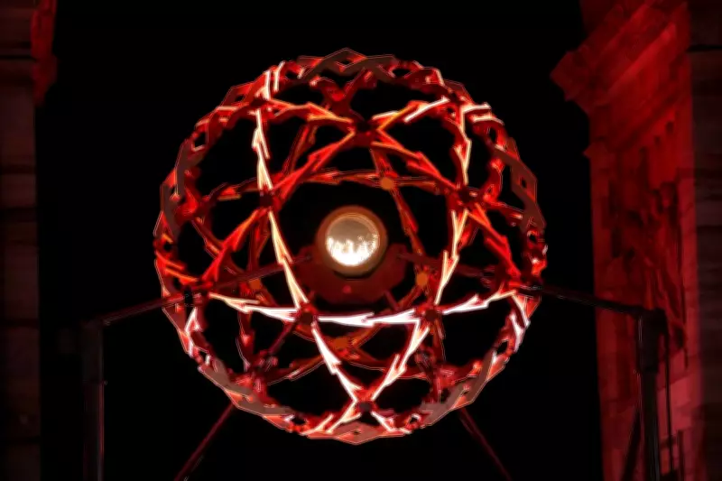 Milan's Olympic Cauldron Light Show Draws Thousands Nightly to Arch of Peace