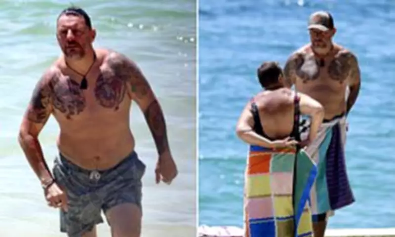 My Kitchen Rules' Manu Feildel Reveals Hidden Tattoos on Sydney Beach Outing