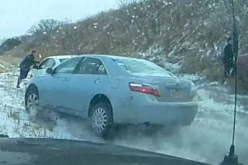 Nebraska Officer's Narrow Escape as Car Skids on I-80 in Snow