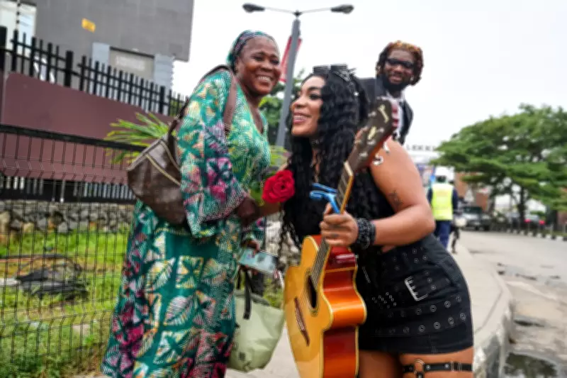Nigerian Rock Artist Spreads Valentine's Love Amid Lagos Hustle