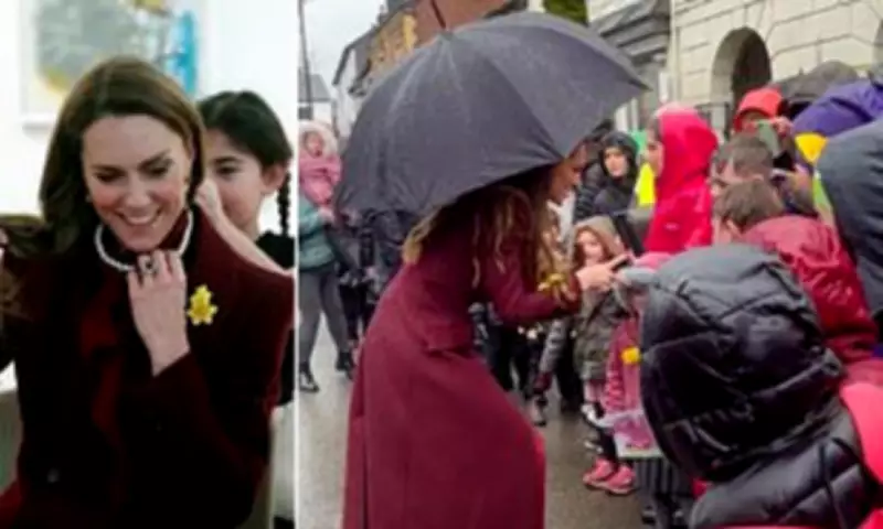 Prince William and Kate's Rainy Welsh Walkabout Wins Hearts with Spontaneous Moments