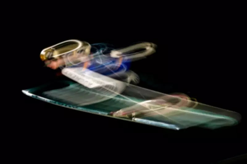 Ski Jumper Giovanni Bresadola Captured in Artistic Flight at Milan Cortina Olympics