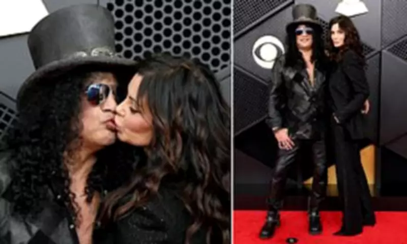 Slash and Meegan Hodges Share Red Carpet Kiss at 2026 Grammy Awards