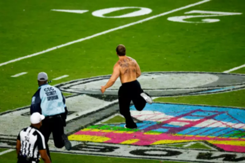 Super Bowl Streaker Halts Game with Cryptic Crypto Message on Bare Back