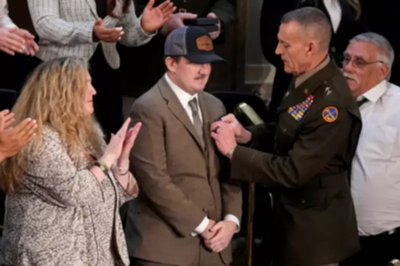 Trump Presents Purple Heart to Guard Members Shot in Washington Ambush