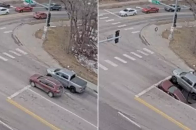 Two Cars Plunge into Sinkhole After Road Collapses at Traffic Stop