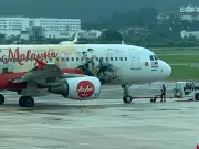 Artist Ernest Zacharevic Sues AirAsia Over Plane Street Mural Removal