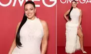 Ashley Graham Stuns in White Gown at Omega Milan Party During Olympics
