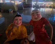 Bangkok Police Use Creative Disguises to Arrest Criminals at Temple Fairs