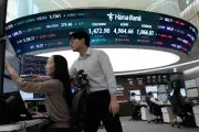 Bitcoin Plummets 9%, Asian Shares Slip Amid Tech Stock Rout
