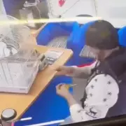 Brazen Budgie Thief Caught on Camera at Tyre Shop in Prescot