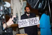 Democrat Ejected from Trump's State of the Union Over 'Black People Aren't Apes' Sign