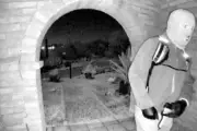 FBI Releases Surveillance Photos of Armed Masked Individual at Missing Woman's Door