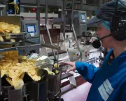 Graham Norton Explores Walkers Crisp Factory in New TV Documentary