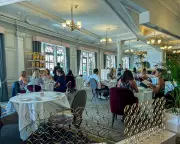 Harrods Faces Legal Battle Over £1 Cover Charge Not Paid to Staff