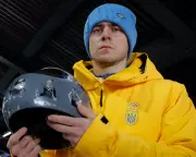 IOC's Ban on Ukrainian Athlete's Memorial Helmet Sparks Outcry and Debate
