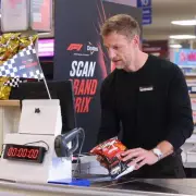 Jenson Button Defeated by Supermarket Cashier in Doritos Scan Grand Prix